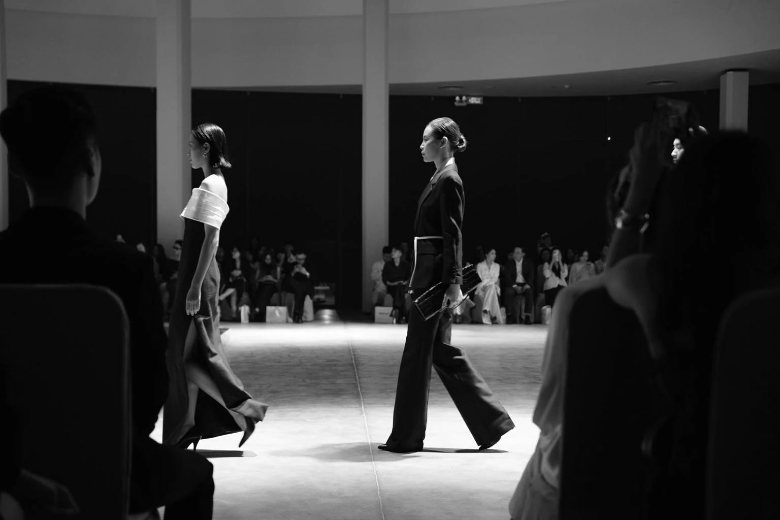 WHITE ANT models crossing the runway during a presentation in Vietnam